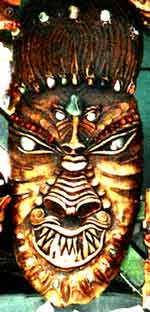 Close up of a demon mask with 2 faces, spotted in Salvador, Brazil, photo by Jim McPherson, 2006